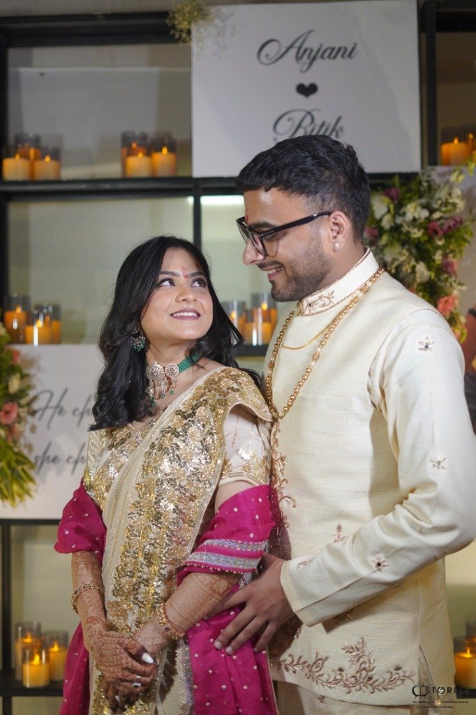 Romantic engagement ceremony setup with lights and florals